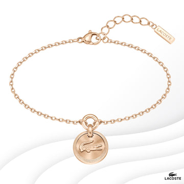 Ατσάλινο βραχιόλι Lacoste 2040405 σε ροζ χρυσό χρώμα με στρογγυλό κρεμαστό στοιχείο και ρυθμιζόμενο κούμπωμα από ανοξείδωτο ατσάλι.